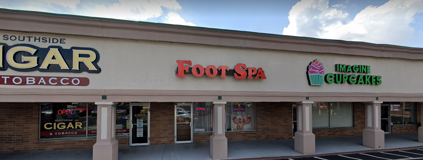 Showing Fot Spa massage Indiananapolis IN at strip mall, between Cigar shop and a Cupcake bakery